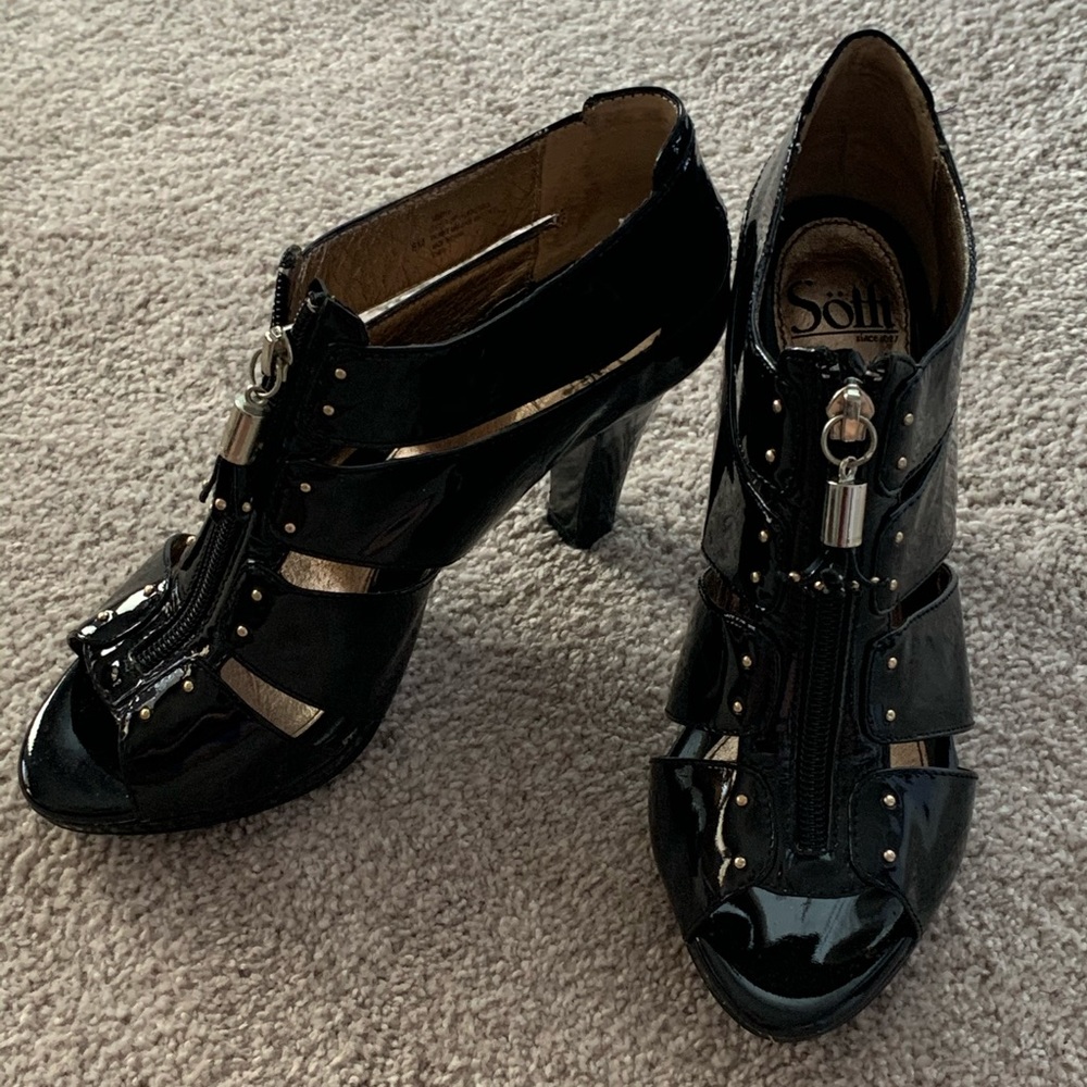 Black heels with metal accent zipper